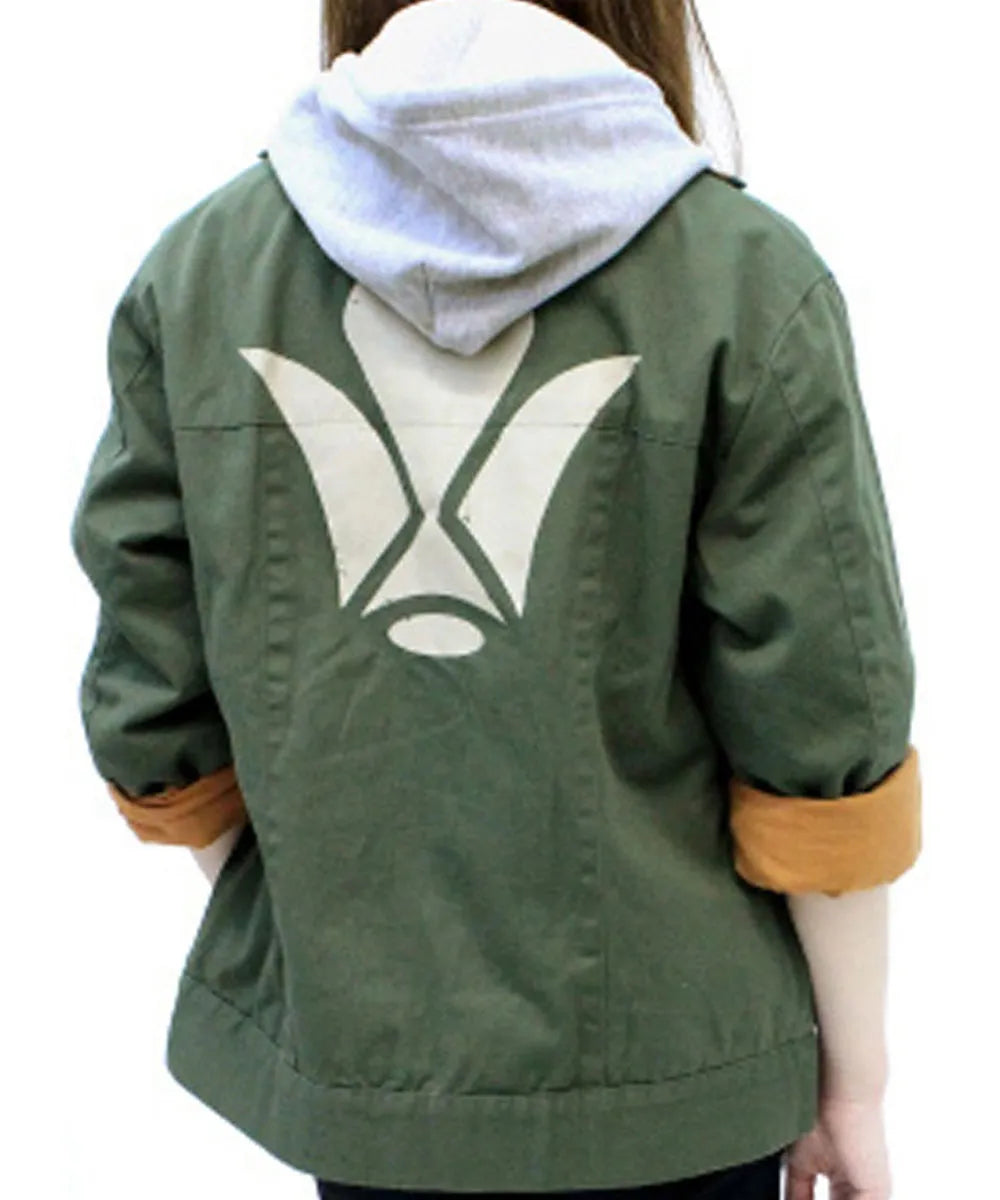 An olive green hooded jacket with a large white geometric graphic on the back, featuring tan lining on the rolled-up sleeves, shown on a model from the back.